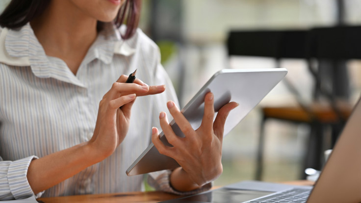 Woman working with a tablet.